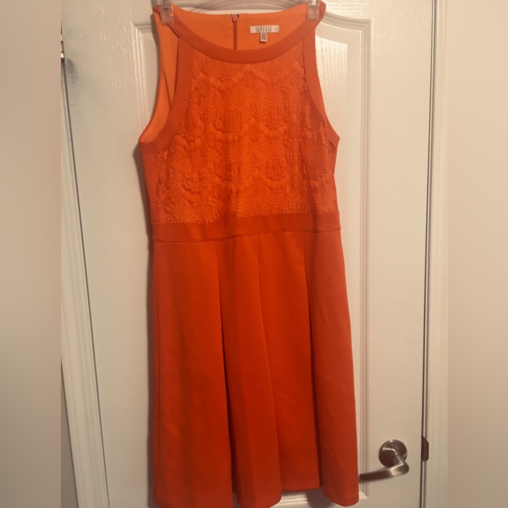 Stylish orange dress.
